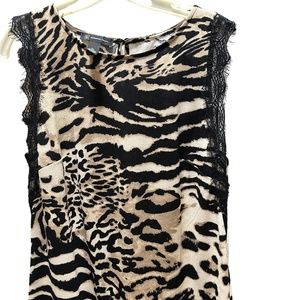 Animal print sleeveless top with lace accents Inc Incorporated